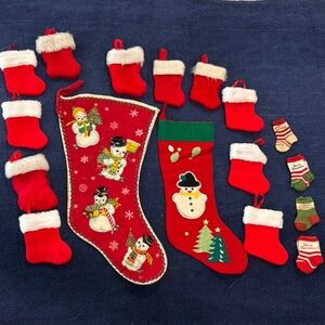 Two Vintage 1950 holiday stockings & misc other smaller Holiday Stockings